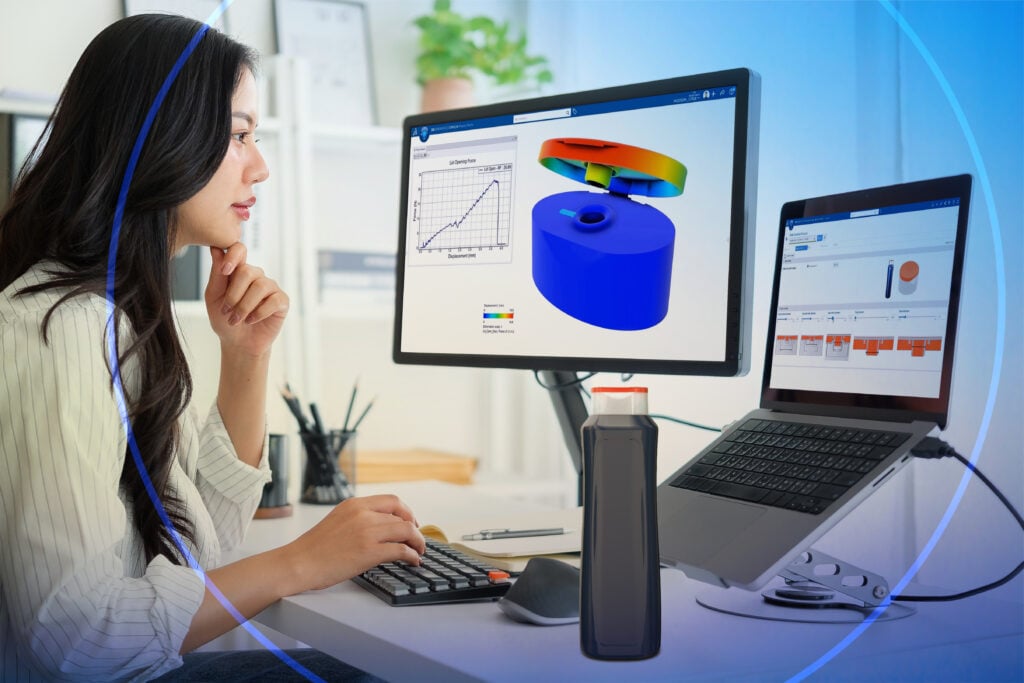 Woman focused on software development at laptop